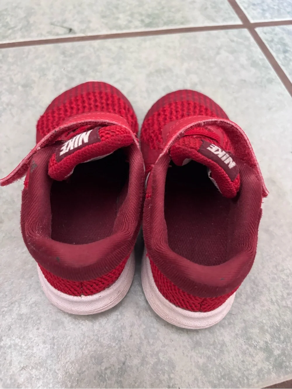 Nike Kids' red Mesh Athletic Shoes. Velcro  closure.